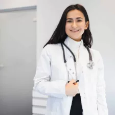 portrait of happy female doctor with stethoscope